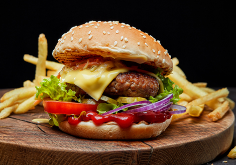 juicy burgers with fries on a plate served at Marinis Takeaway in Motherwell 